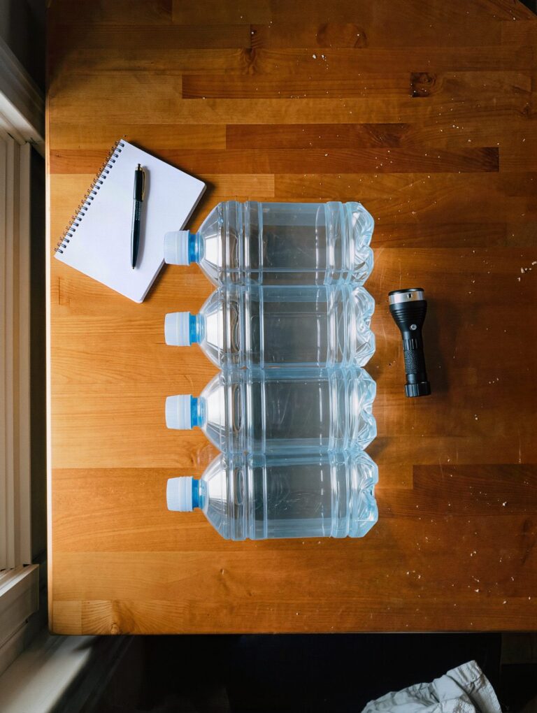 Gallon water jugs on a kitchen table